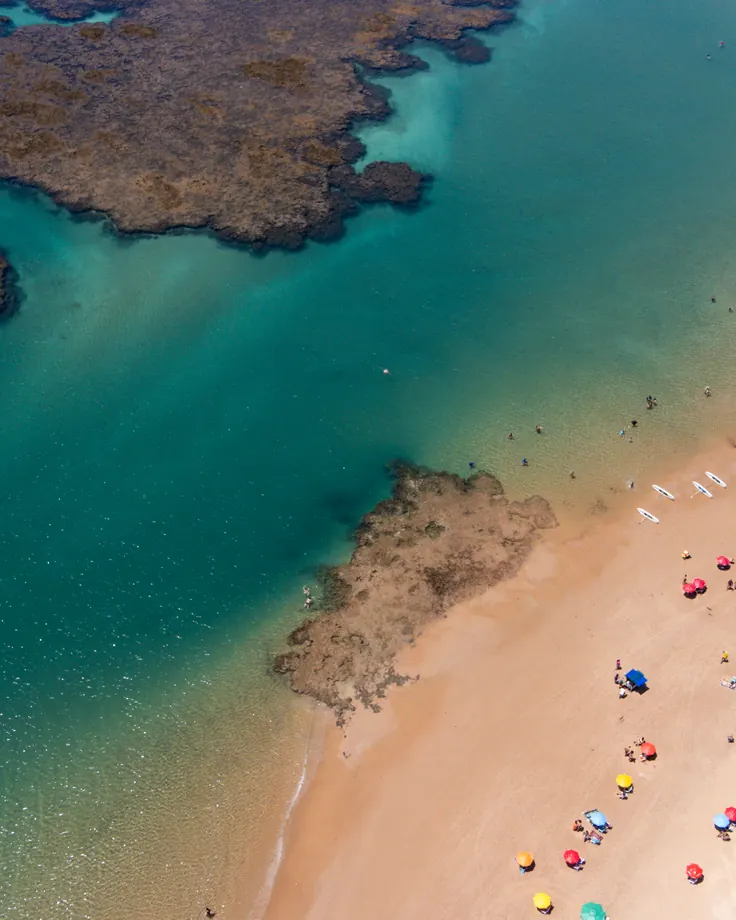 Aerial view of the natural pools between the reefs and the beach of Taipu de Fora
